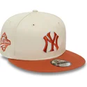 casquette-plate-beige-et-marron-snapback-9fifty-patch-new-york-yankees-mlb-new-era