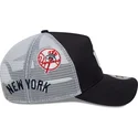 casquette-trucker-bleue-marine-et-blanche-a-frame-multi-patch-new-york-yankees-mlb-new-era