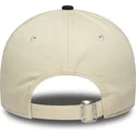 casquette-courbee-beige-et-bleue-marine-ajustable-pour-femme-9twenty-new-era