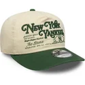casquette-courbee-beige-et-verte-ajustable-19twenty-washed-graphic-new-york-yankees-mlb-new-era