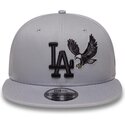 casquette-plate-grise-snapback-avec-logo-noir-9fifty-outdoor-icon-los-angeles-dodgers-mlb-new-era