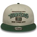 casquette-plate-verte-et-beige-snapback-pour-enfant-9fifty-tortues-ninja-new-era